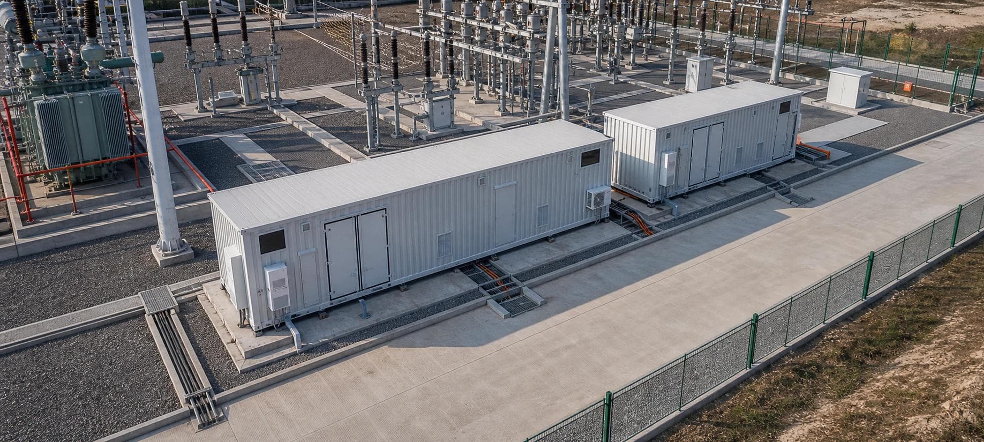 Aerial application view of electrical E-House modules for a synchronous condenser project in a substation